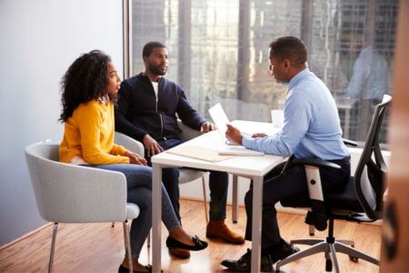 Couple meeting with lawyer